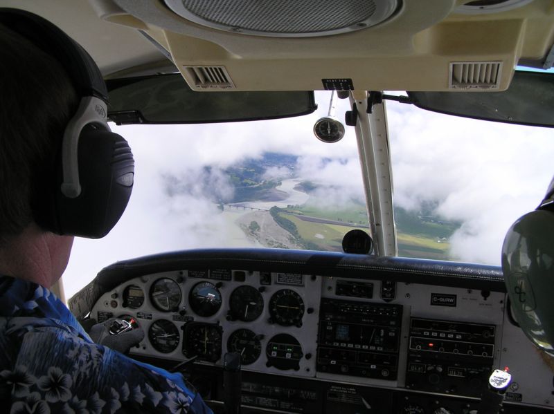 Langley Flying School's Piper Seneca breaking out thorough cloud during an instrument approach on the north coast of California.  Tom Larkin is piloting.